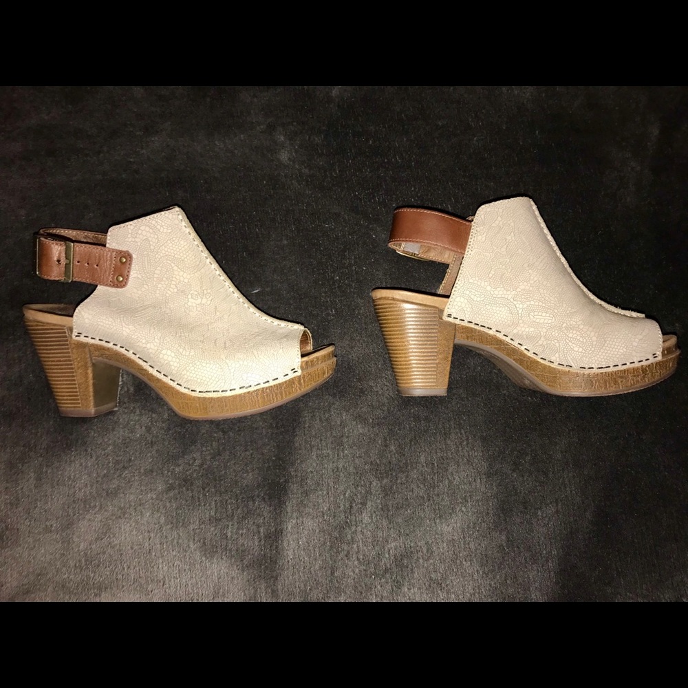 Super comfortable Dansko heels with peep toes.